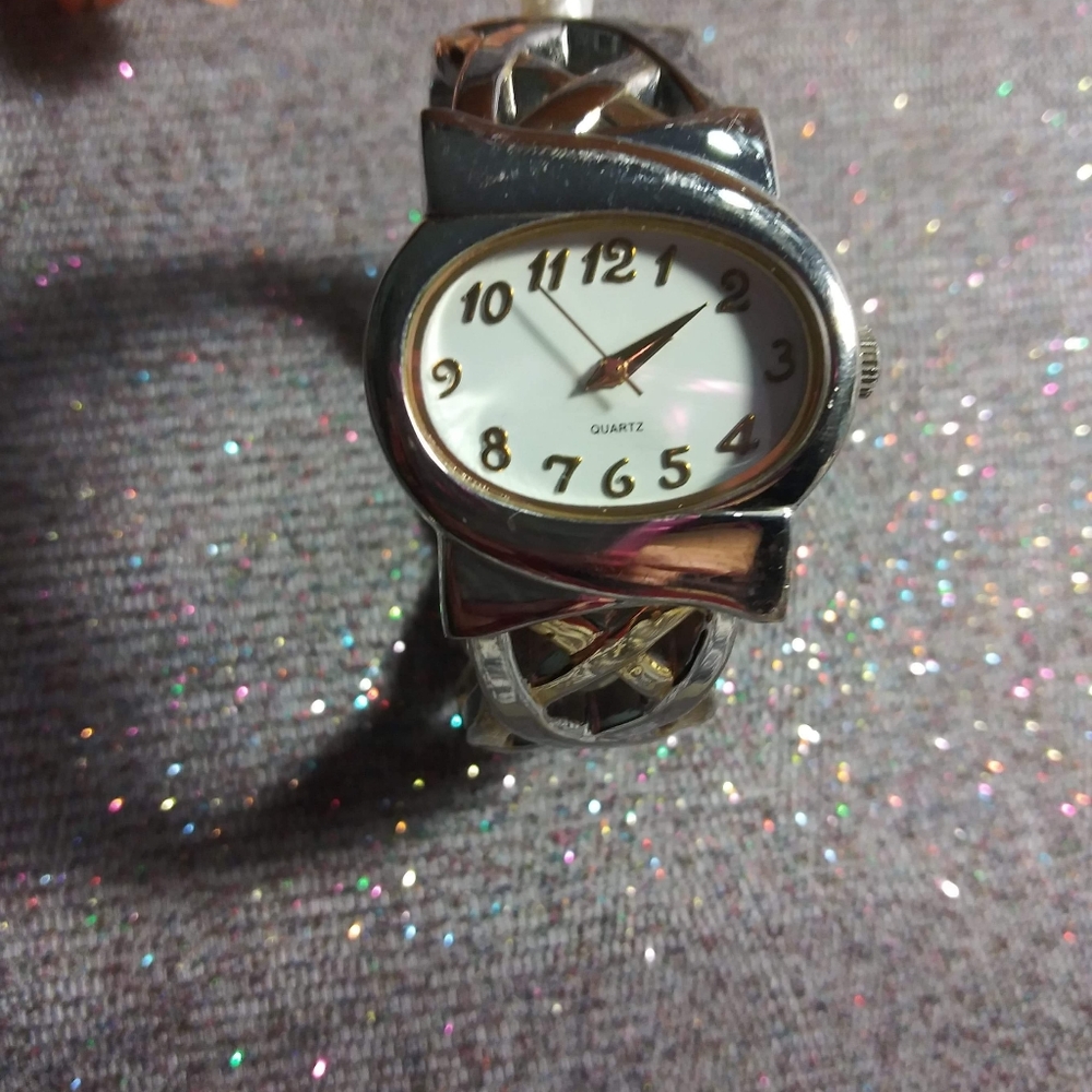 Gold and silver cuff watch